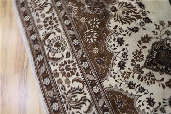 A cream ground Tabriz carpet, 350 x 246cm